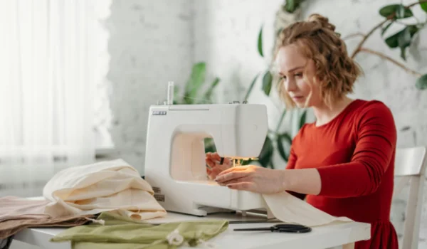 Girl Stitching Cloth